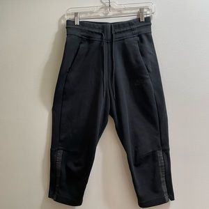 Black woman’s Nike capris